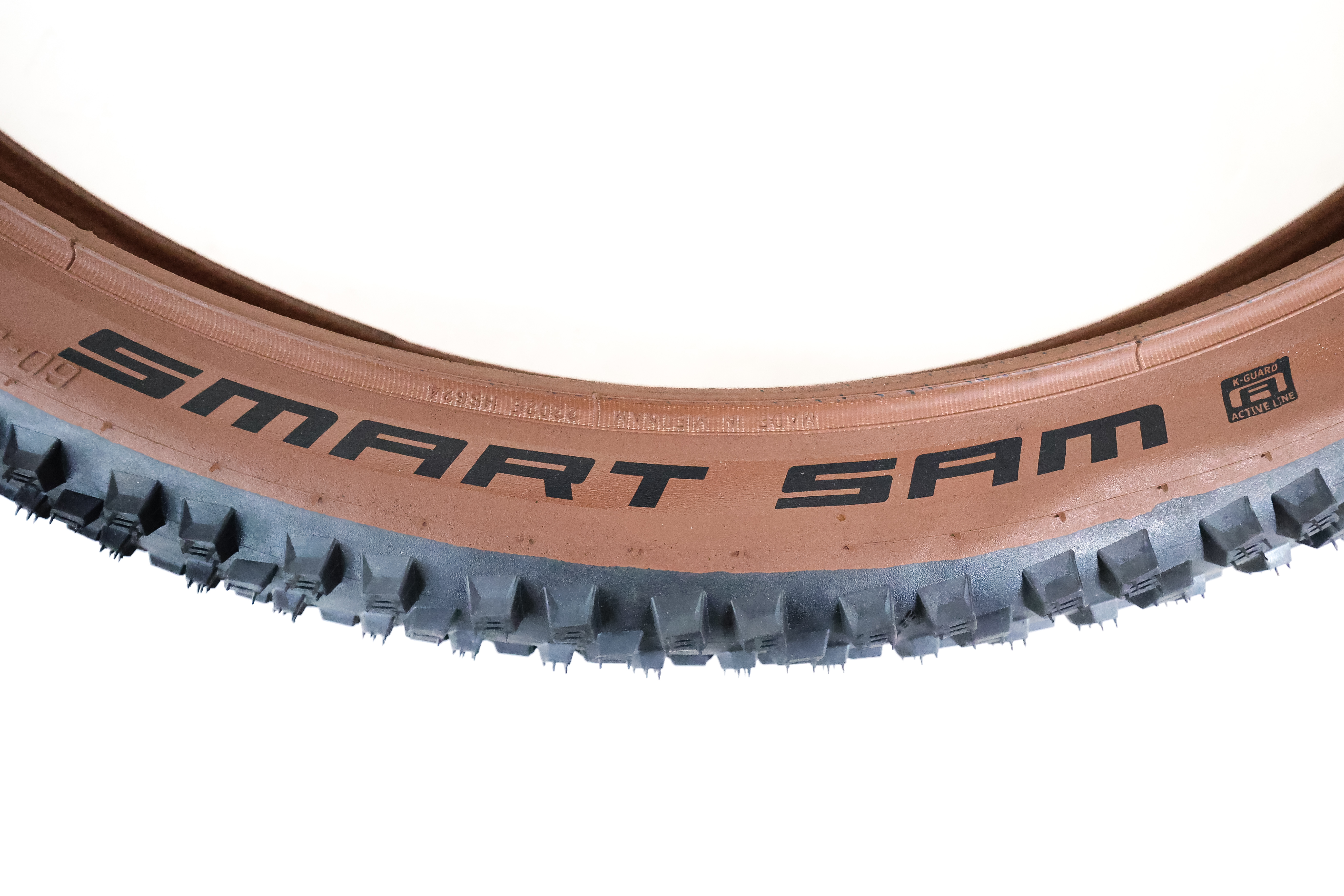 Schwalbe Smart Sam 60-584 27.5x2.35 K-Guard Active Line schwarz-bronze / tan wall